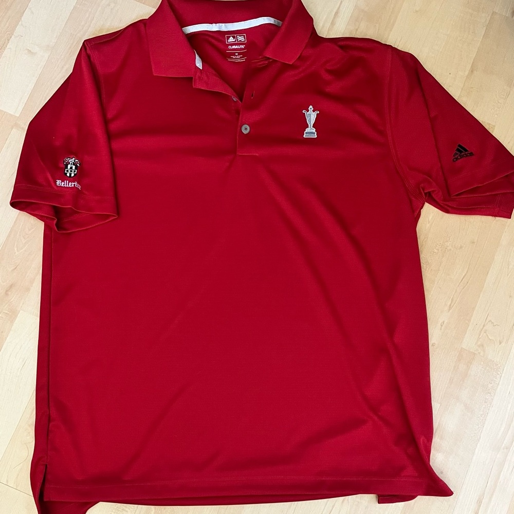 Red adidas golf polo from 100th PGA championship at Bellerive Country Club.
